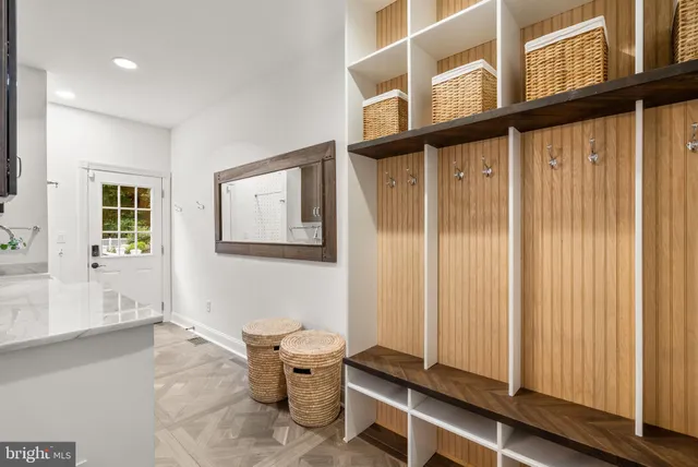 a view of a house with backyard sitting area and garden