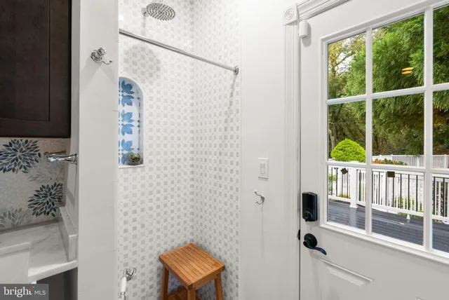 an aerial view of a house a yard and lake view