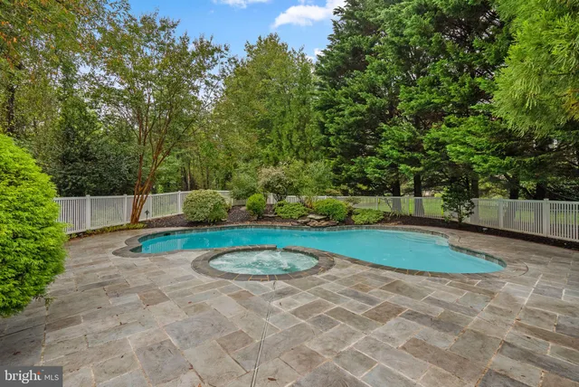 a living room with furniture fireplace and a flat screen tv