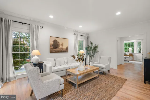 a work room with furniture and windows