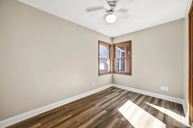 a view of a livingroom with a washer and dryer