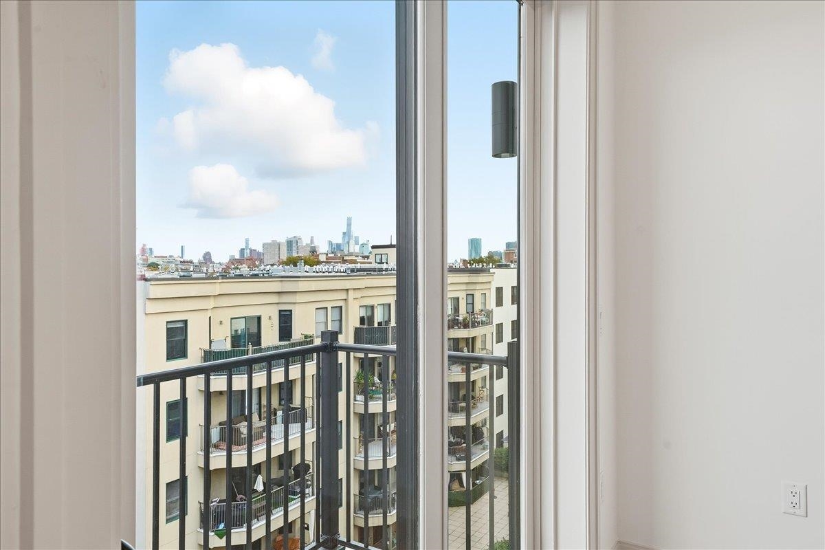 921 Madison Street, Unit 604 Hoboken, NJ 07030 - Photo 12 of 22 a view of a balcony with city view