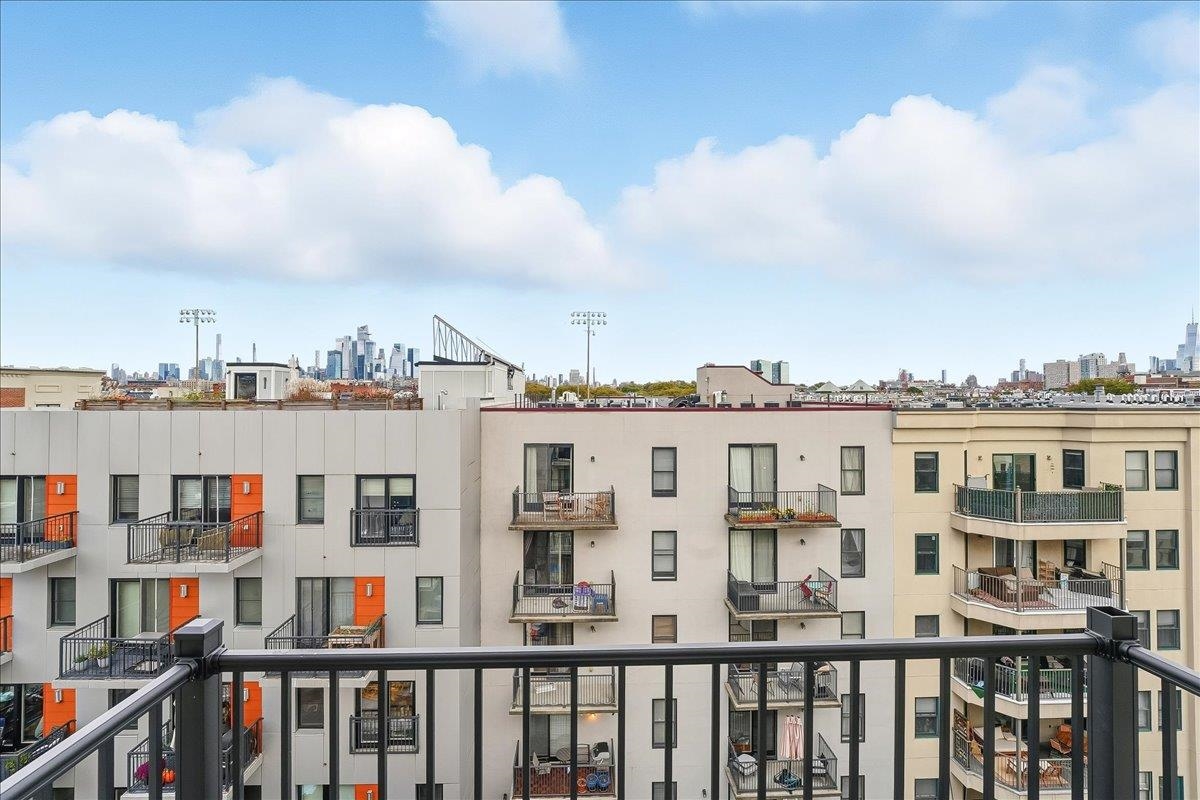 921 Madison Street, Unit 604 Hoboken, NJ 07030 - Photo 19 of 22 a view of buildings from the balcony
