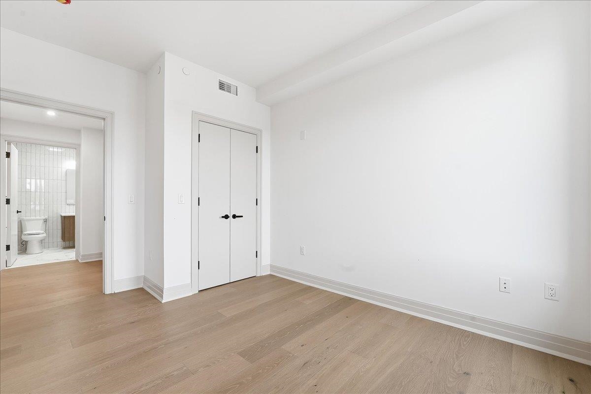 921 Madison Street, Unit 604 Hoboken, NJ 07030 - Photo 10 of 22 wooden floor in an empty room