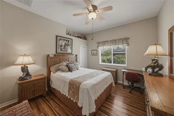 a view of a swimming pool with a porch