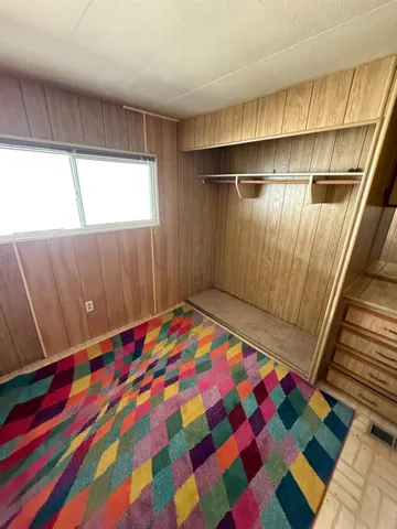 a room with a small space and a sink