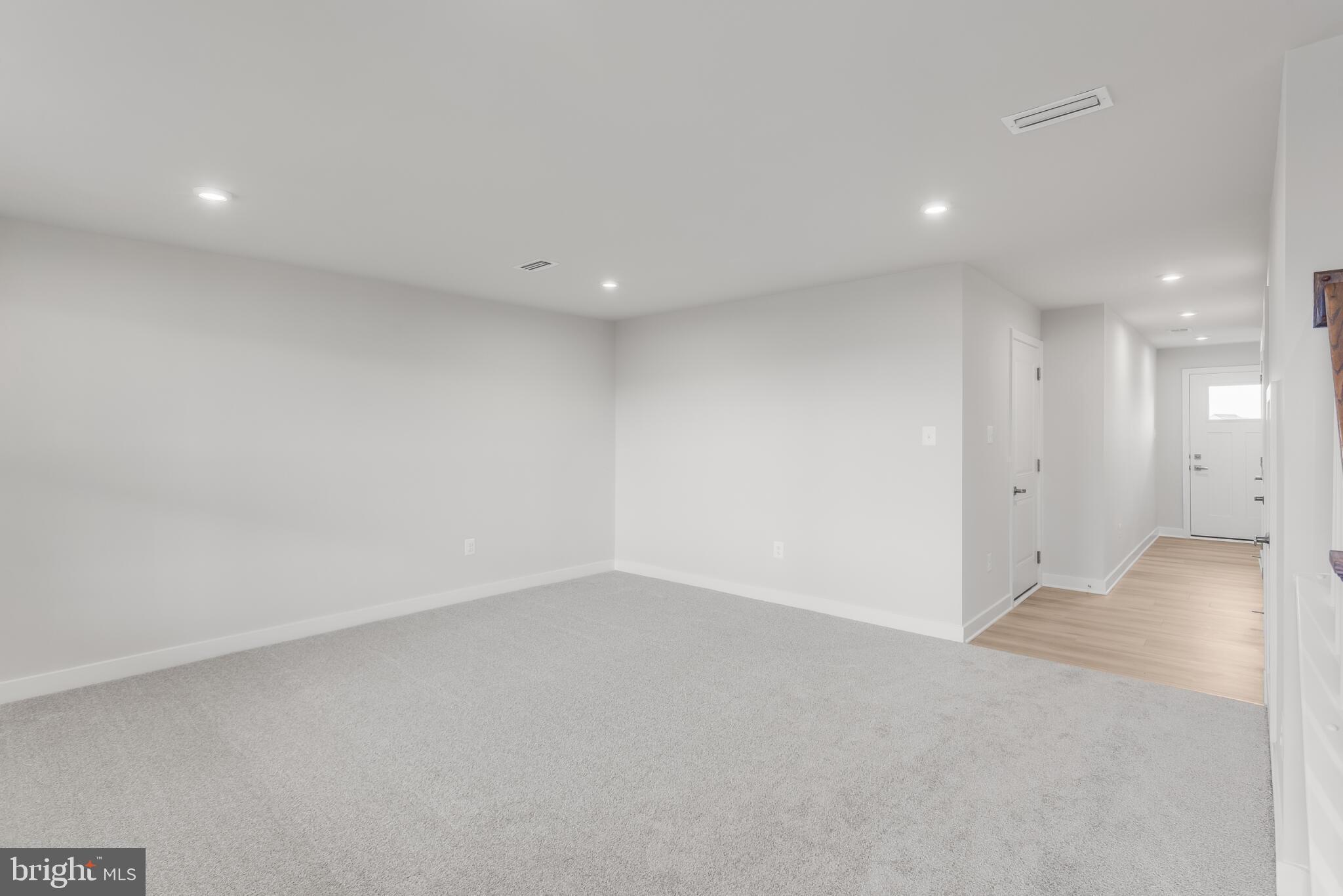 1729 Destrier Street Ranson, WV 25438 - Photo 2 of 16 an empty room with a empty space