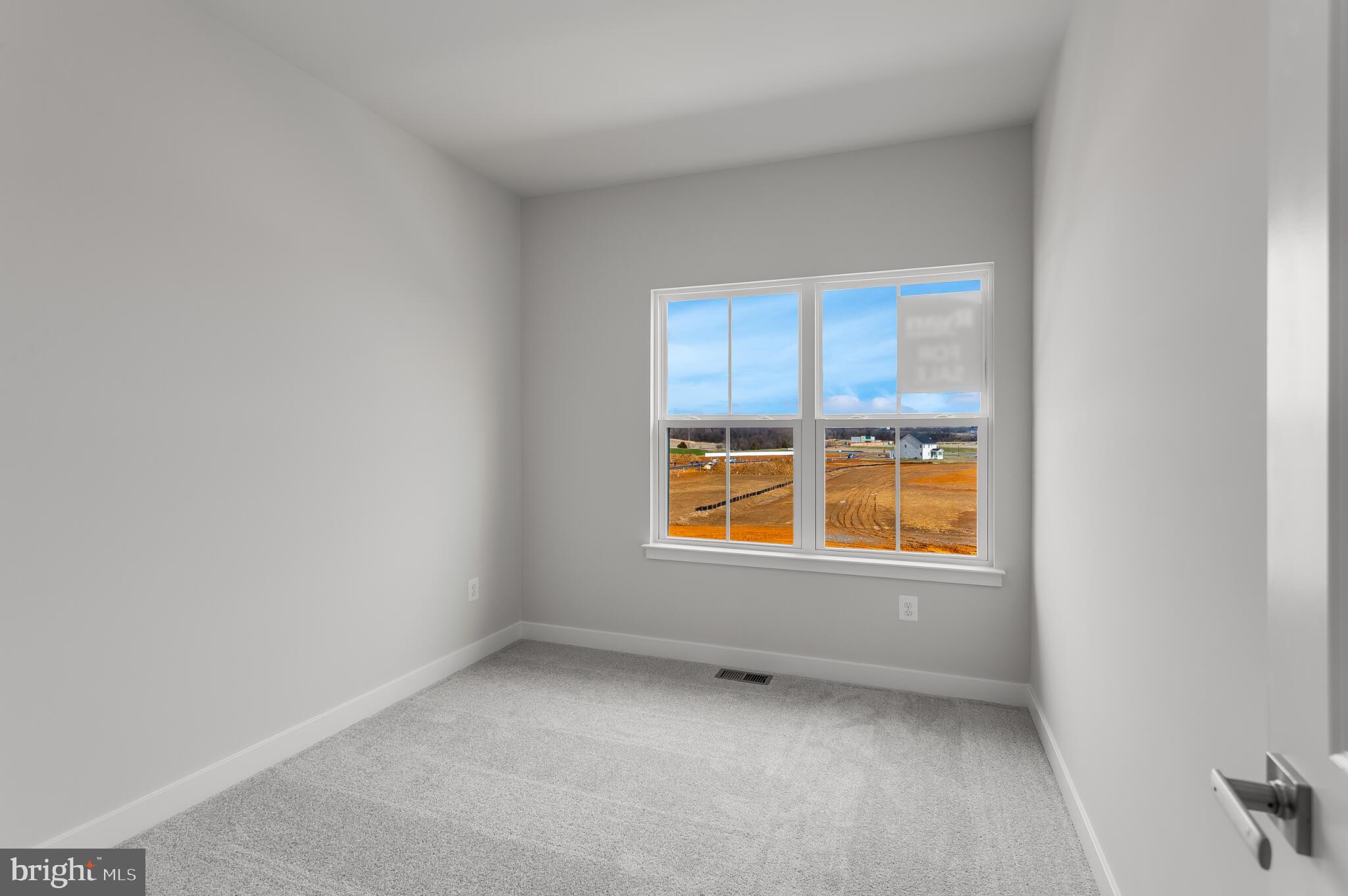1729 Destrier Street Ranson, WV 25438 - Photo 10 of 16 an empty room with a window