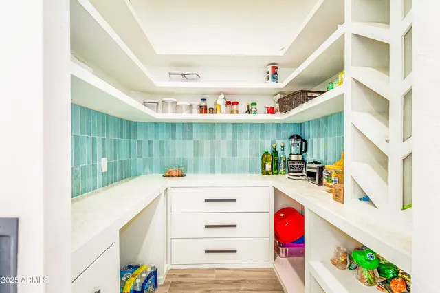 a view of a living room with a sink