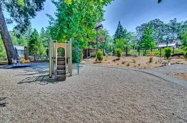 a view of backyard with green space