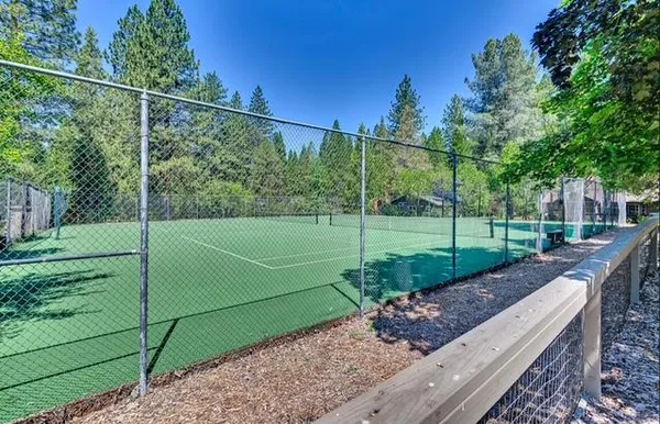 a view of a lake with a yard