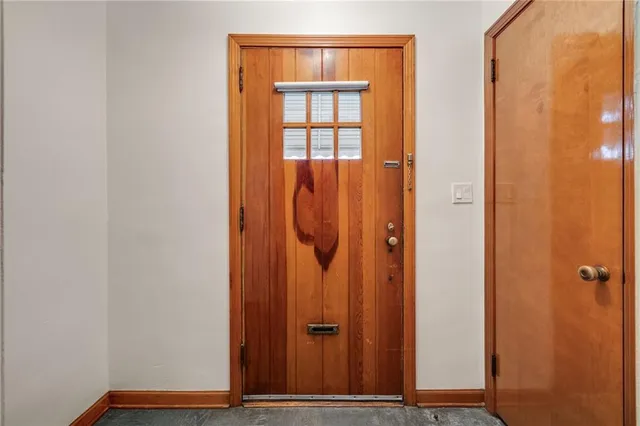 wooden door with glass door
