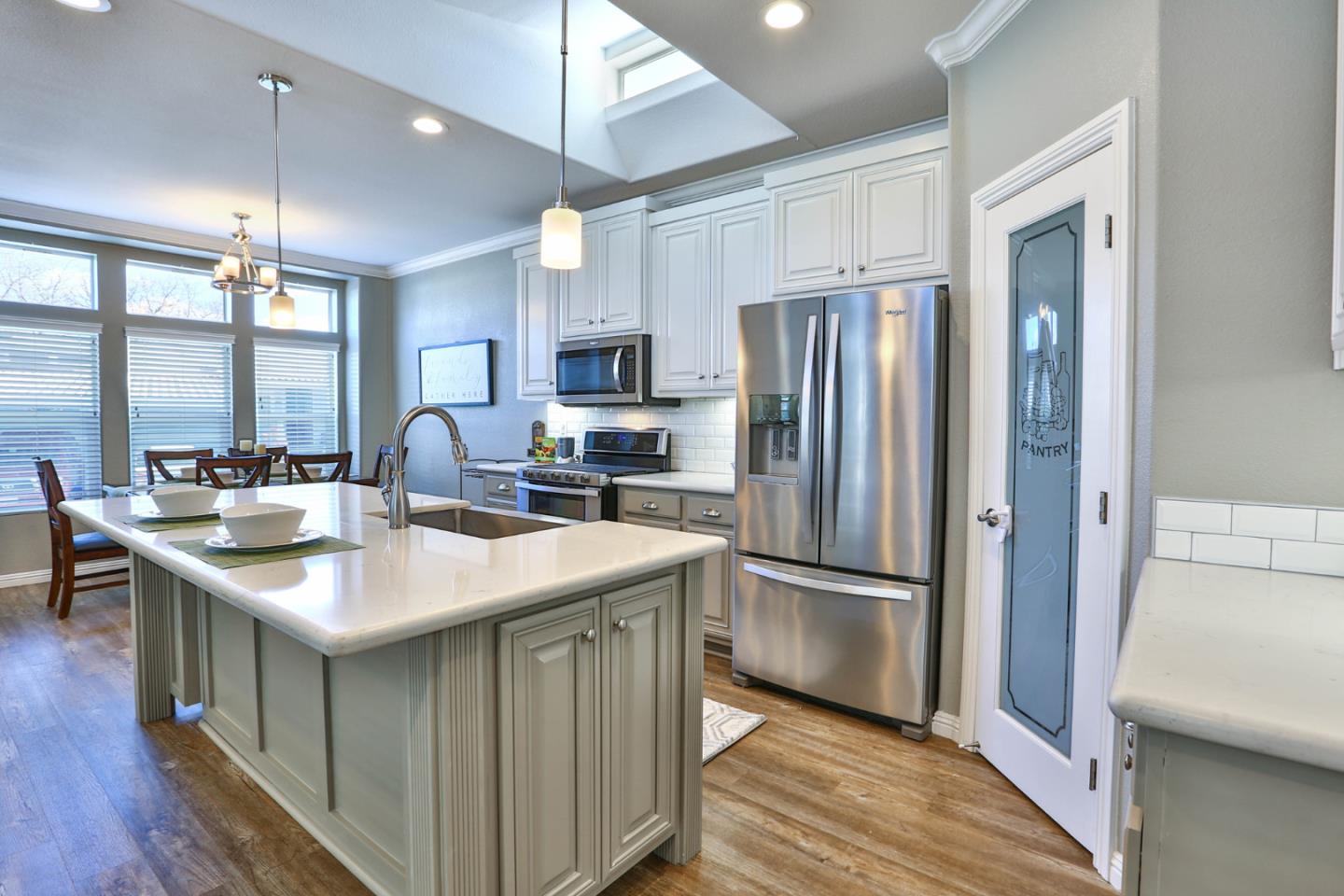 136 Timber Cove Drive, Unit 136 Campbell, CA 95008 - Photo 13 of 36 a kitchen with stainless steel appliances granite countertop a sink stove and refrigerator