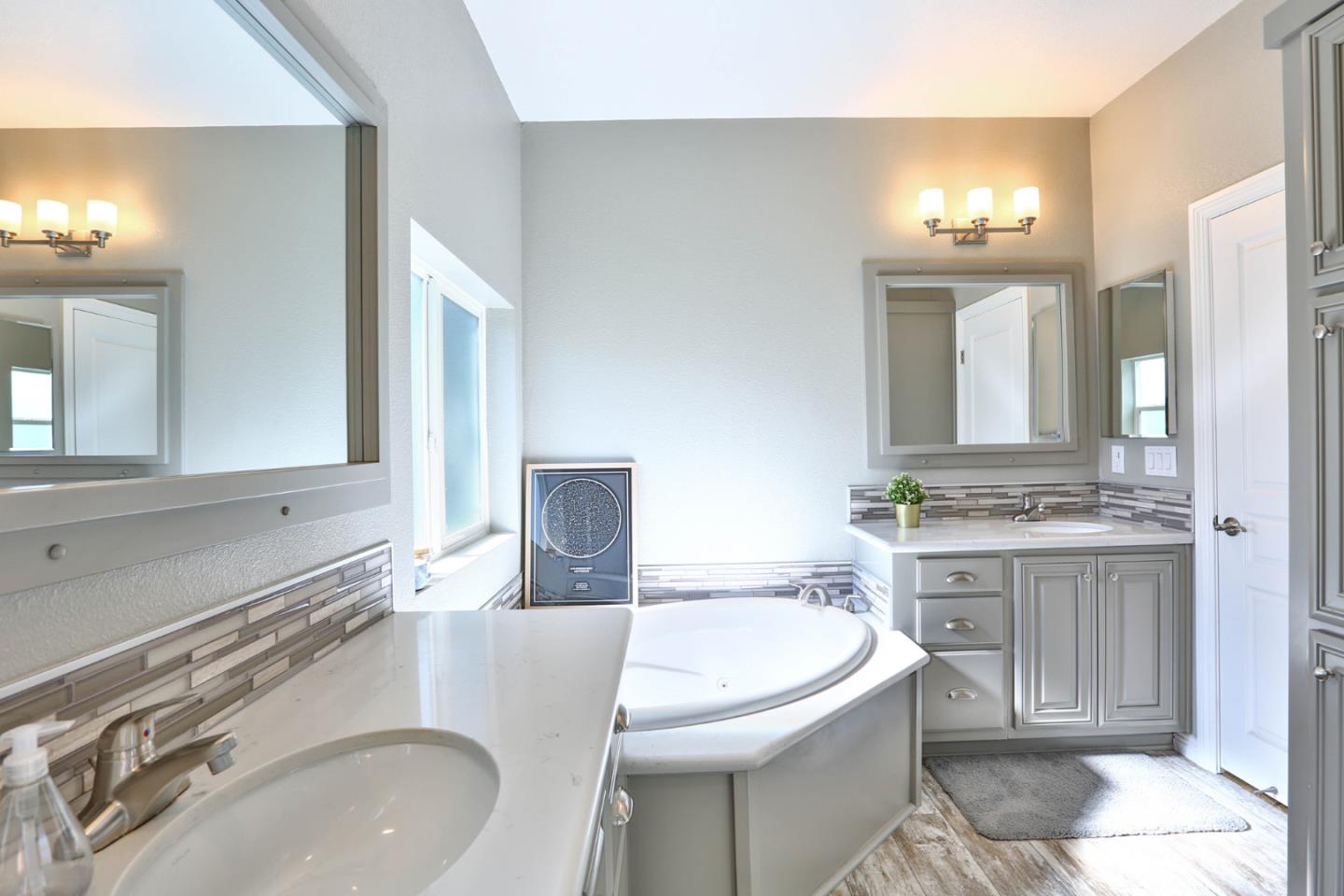 136 Timber Cove Drive, Unit 136 Campbell, CA 95008 - Photo 21 of 36 a bathroom with a sink and a mirror