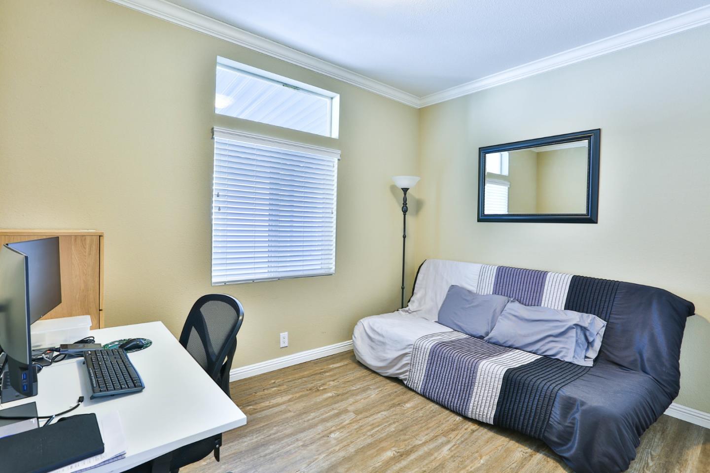 136 Timber Cove Drive, Unit 136 Campbell, CA 95008 - Photo 24 of 36 a living room with furniture and window