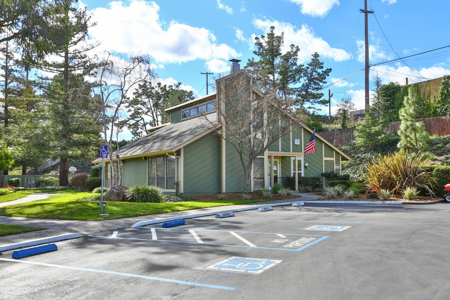 136 Timber Cove Drive, Unit 136 Campbell, CA 95008 - Photo 31 of 36 a front view of a house with a yard and potted plants