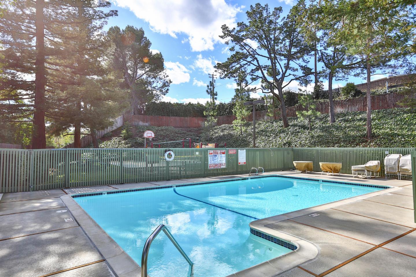 136 Timber Cove Drive, Unit 136 Campbell, CA 95008 - Photo 33 of 36 a view of a lake with a terrace