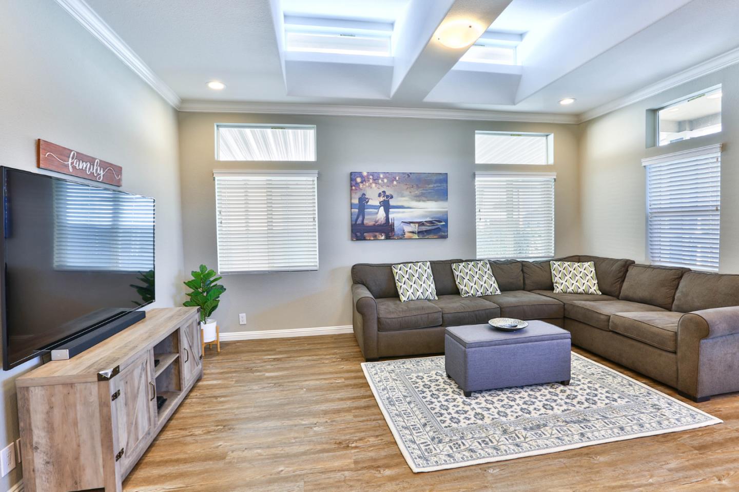 136 Timber Cove Drive, Unit 136 Campbell, CA 95008 - Photo 6 of 36 a living room with furniture and a flat screen tv