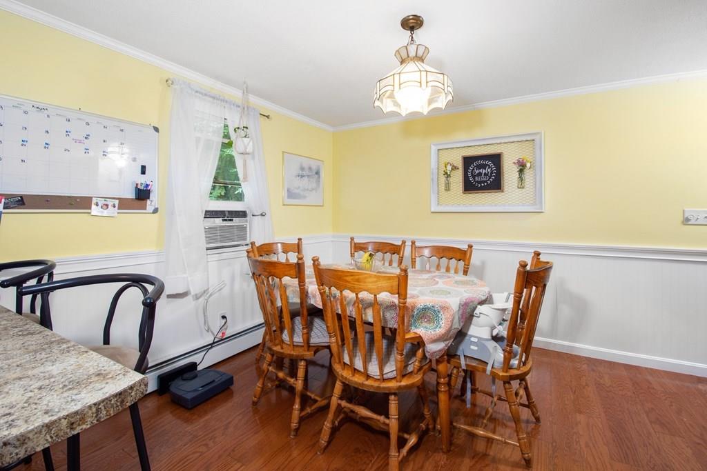 154 Shepard Road Sturbridge, MA 01566 - Photo 6 of 24 a view of a dining room with furniture and chandelier