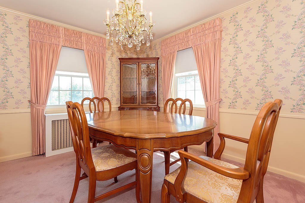 45 Magnolia Road Milton, MA 02186 - Photo 12 of 26 a view of a dining room with furniture window and outside view