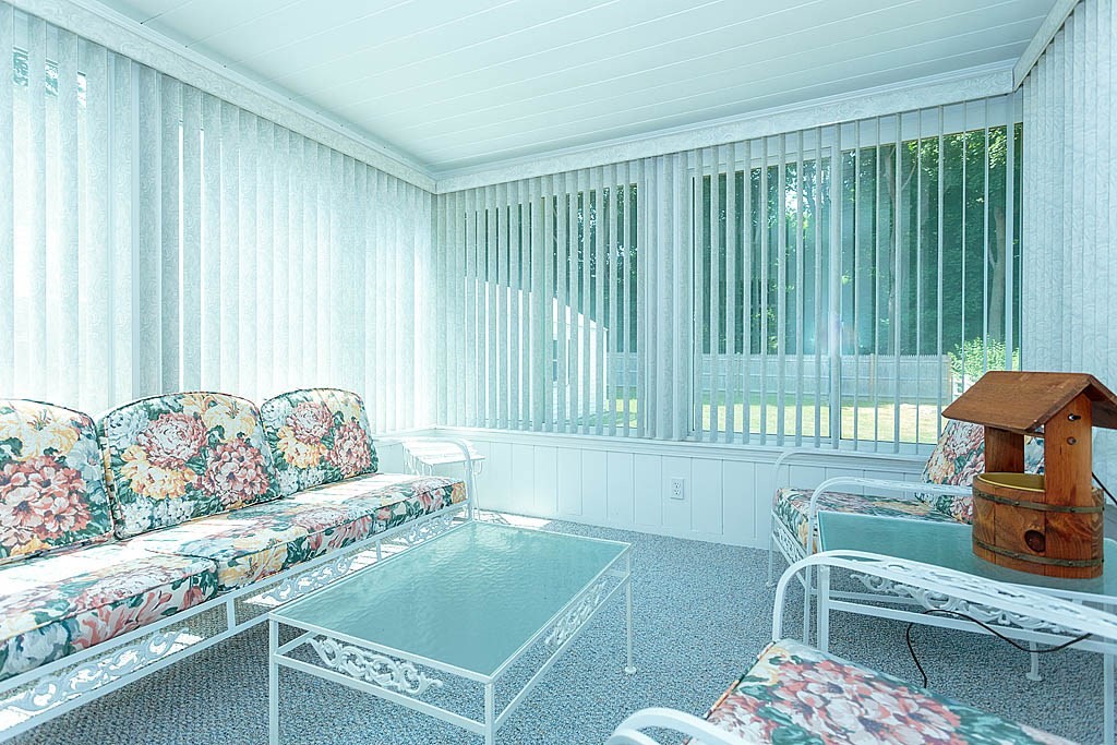 45 Magnolia Road Milton, MA 02186 - Photo 15 of 26 a living room with furniture and a window