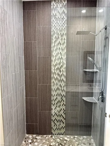 a utility room with sink dryer and washer