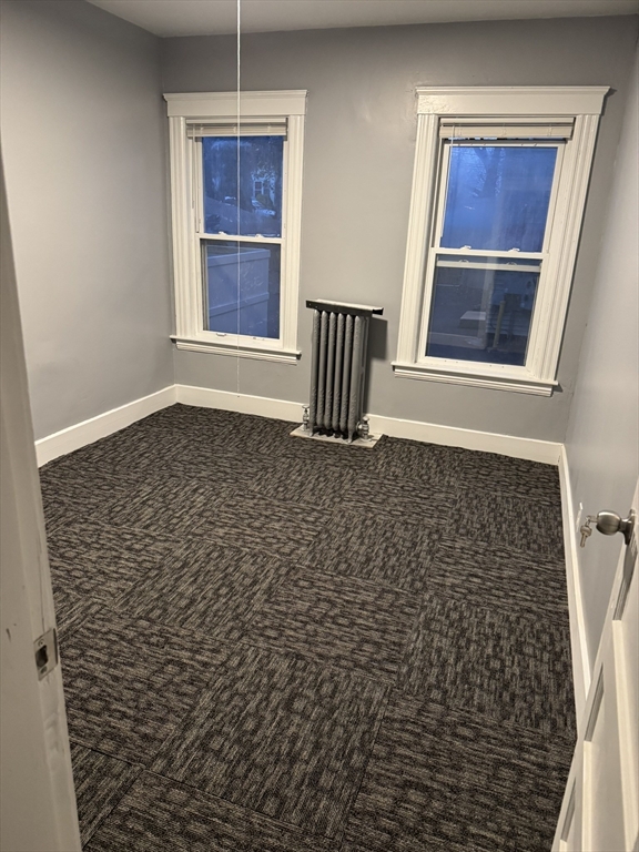 57 Hamilton Street, Unit 1 Worcester, MA 01604 - Photo 13 of 14 a bathroom with a window