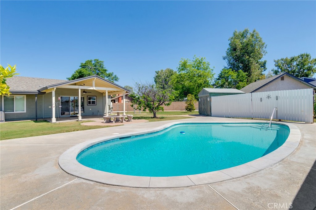 9130 Duncan Avenue Riverside, CA 92503 - Photo 27 of 34 a view of outdoor space yard swimming pool and patio