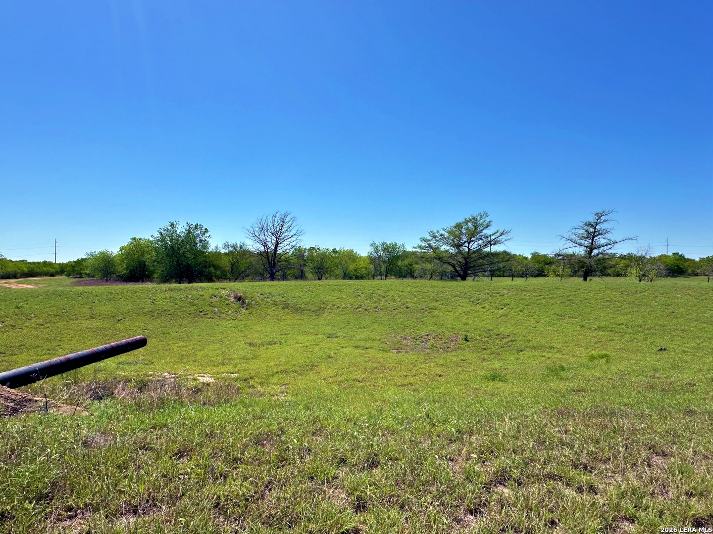 3265 Highway 97 Jourdanton, TX 78026 - Photo 10 of 23 a view of a lake with a big yard