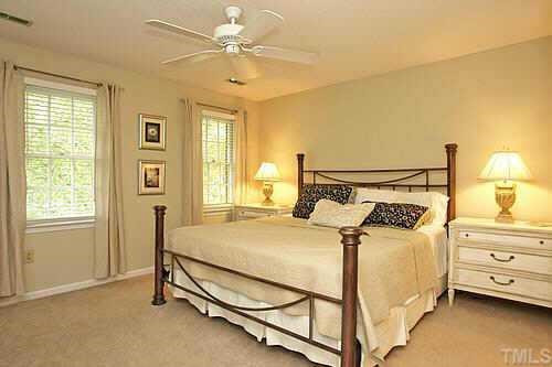 405 Maylands Avenue Raleigh, NC 27615 - Photo 6 of 10 Newly painted master w/ plush neutral carpet, walk-in closet, ceiling fan & wood blinds easily fits King bedroom suite. More great views & lighting here too! Other