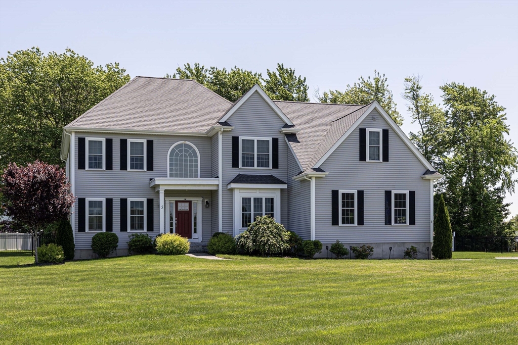 5 Box Mill Road Hopkinton, MA 01748 - Photo 1 of 42 a front view of a house with a garden
