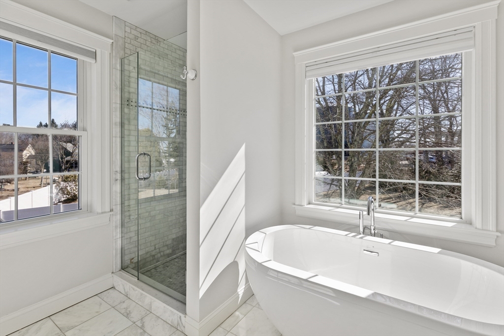 5 Box Mill Road Hopkinton, MA 01748 - Photo 29 of 42 a bathroom with a bathtub and a shower
