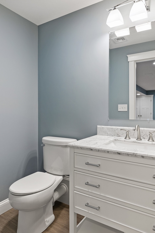 5 Box Mill Road Hopkinton, MA 01748 - Photo 37 of 42 a bathroom with a granite countertop toilet sink and mirror