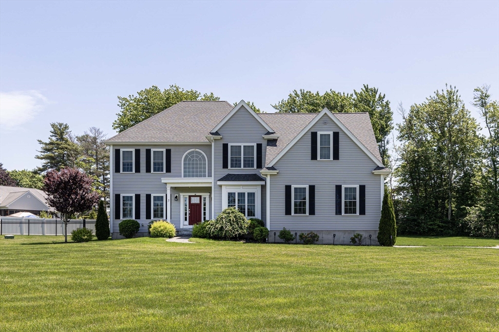5 Box Mill Road Hopkinton, MA 01748 - Photo 5 of 42 a front view of a house with a garden