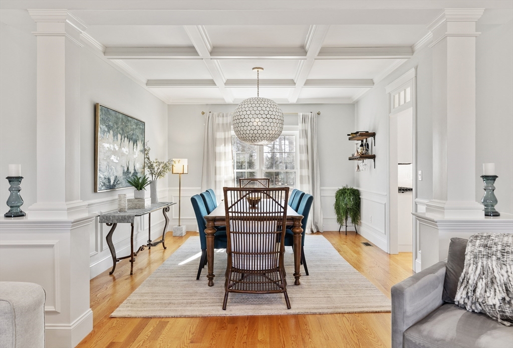 5 Box Mill Road Hopkinton, MA 01748 - Photo 9 of 42 a dining room with furniture a chandelier and wooden floor