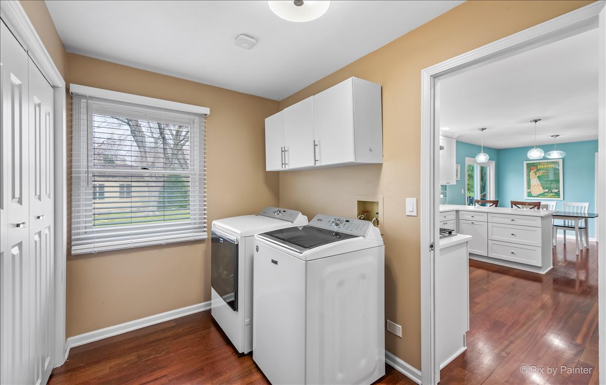 254 Perth Road Cary, IL 60013 - Photo 16 of 36 a view of kitchen and hall with wooden floor
