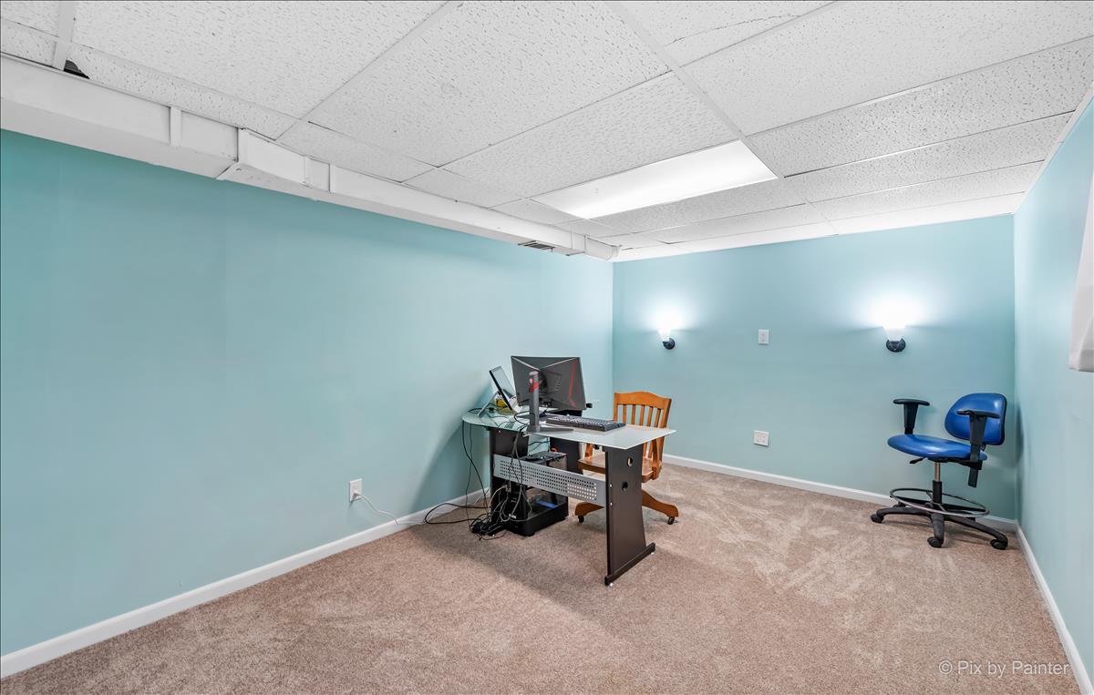 254 Perth Road Cary, IL 60013 - Photo 27 of 36 a workspace with furniture and a window