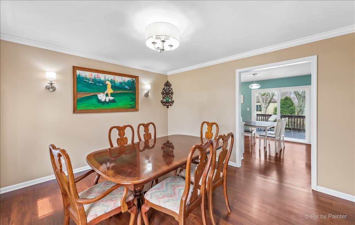 254 Perth Road Cary, IL 60013 - Photo 5 of 36 a view of a dining room with furniture and wooden floor