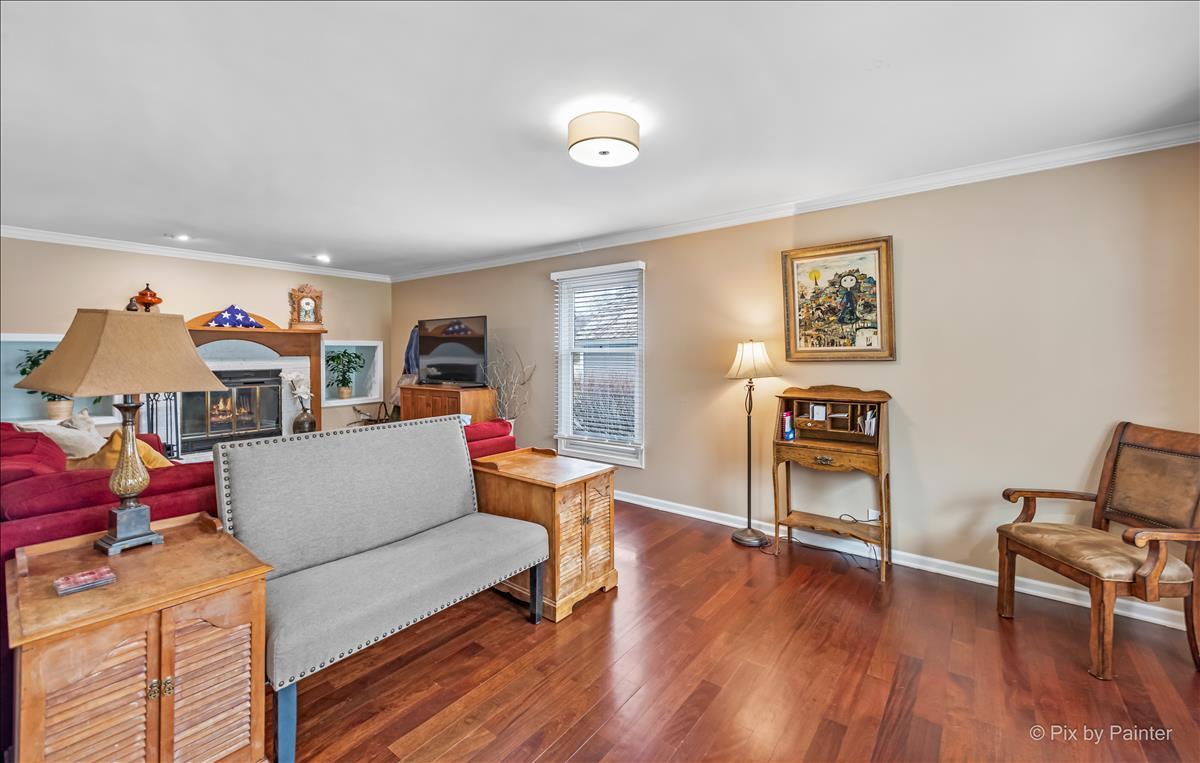 254 Perth Road Cary, IL 60013 - Photo 8 of 36 a living room with furniture and a wooden floor