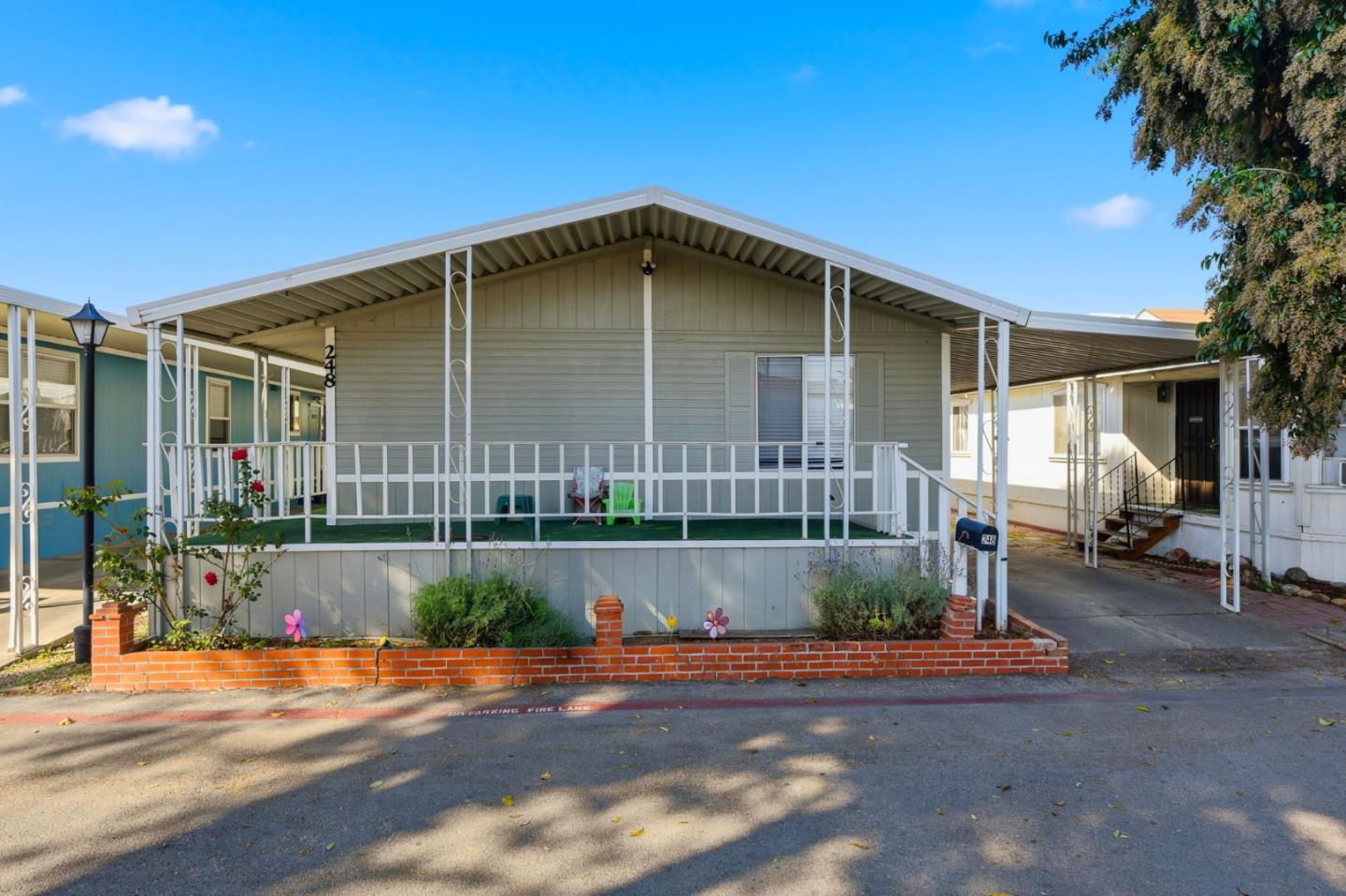 3637 Snell Avenue, Unit 248 San Jose, CA 95136 - Photo 1 of 33 a front view of a house with a garden