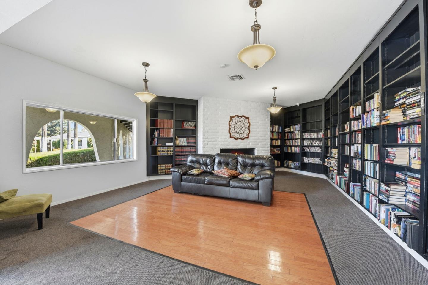 3637 Snell Avenue, Unit 248 San Jose, CA 95136 - Photo 23 of 33 a living room with furniture and a chandelier