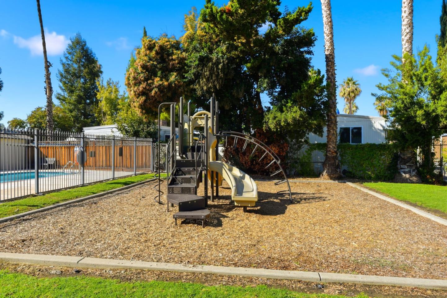 3637 Snell Avenue, Unit 248 San Jose, CA 95136 - Photo 30 of 33 a view of a park with swings