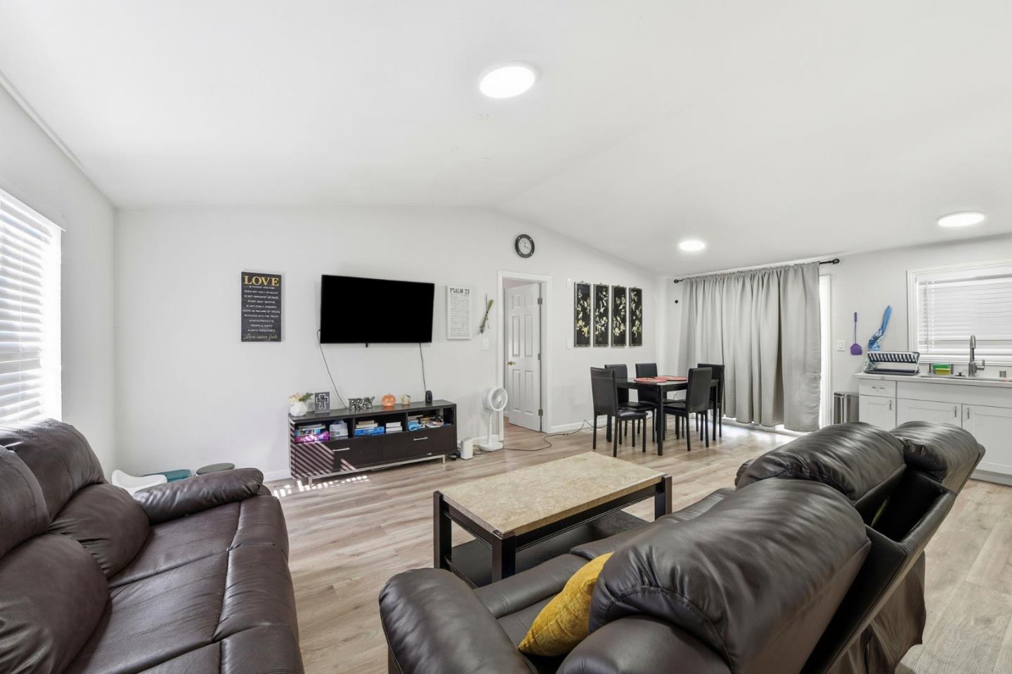 3637 Snell Avenue, Unit 248 San Jose, CA 95136 - Photo 3 of 33 a living room with furniture and a flat screen tv