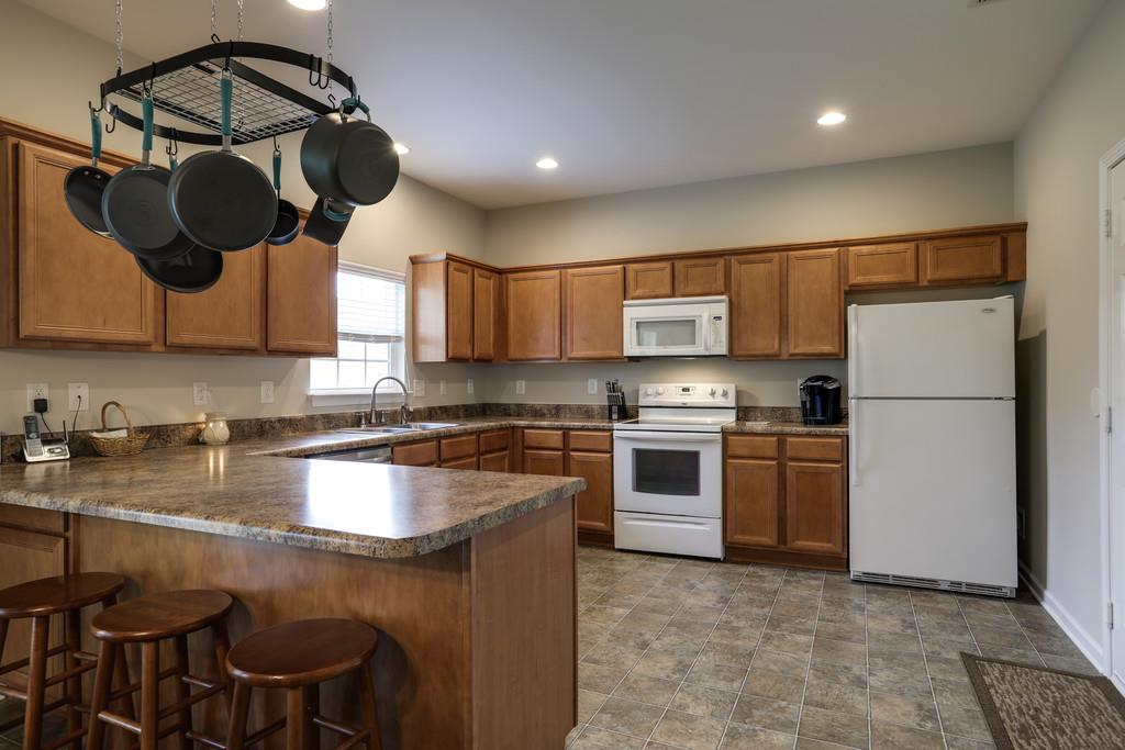 4051 Locerbie Circle Spring Hill, TN 37174 - Photo 11 of 30 Refrigerator, Washer and Dryer will stay!