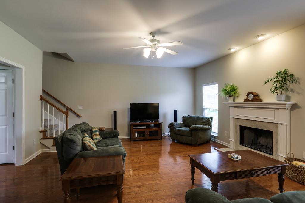 4051 Locerbie Circle Spring Hill, TN 37174 - Photo 8 of 30 Living Room with Wood Burning Fireplace!