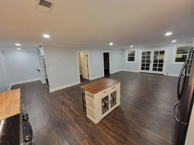 a bathroom with a sink toilet and a mirror