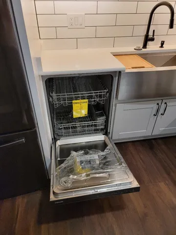 a black and white photo of a living room