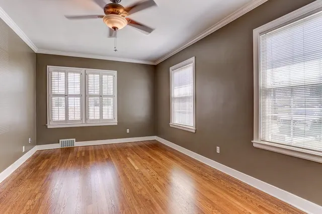 a bathroom with a sink toilet and vanity