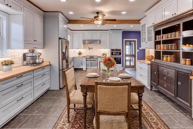 a view of a dining room kitchen and a window