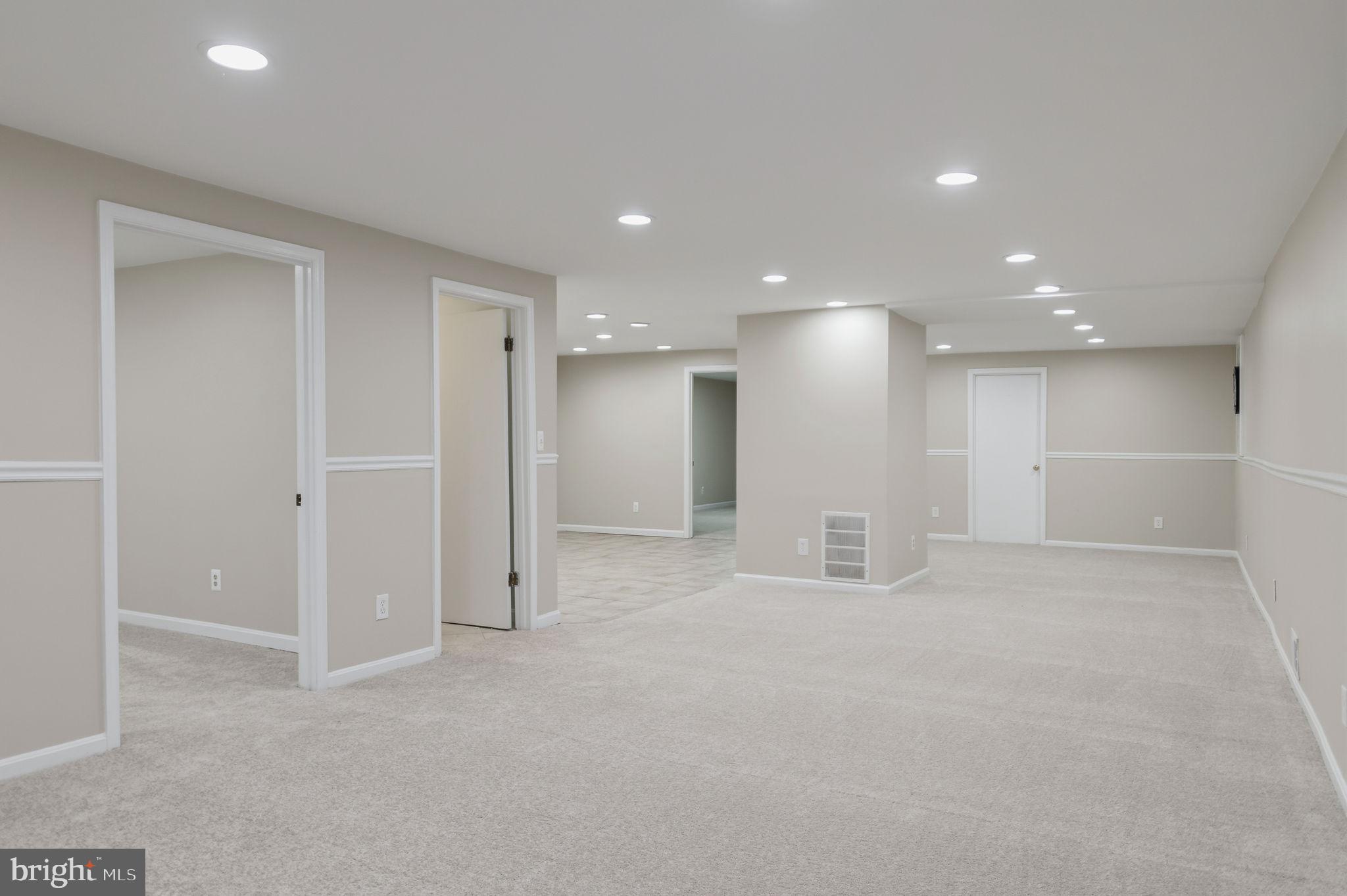 13593 Bethel Road Manassas, VA 20112 - Photo 37 of 54 Spacious rec room with a full bath & 2 bedrooms!